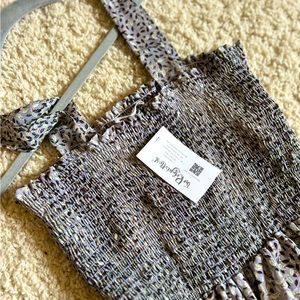 Large, new with tags patterned jumpsuit